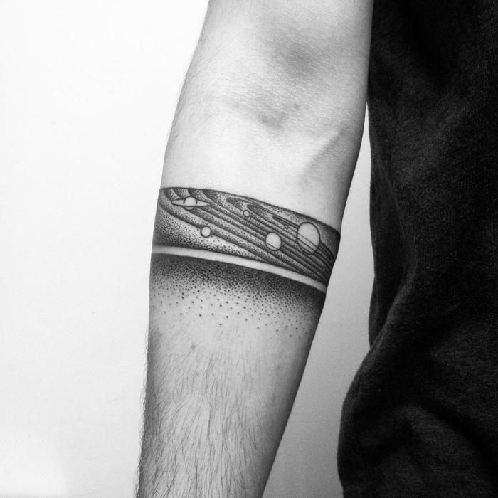 Tattoo in dotwork style on the forearm for men