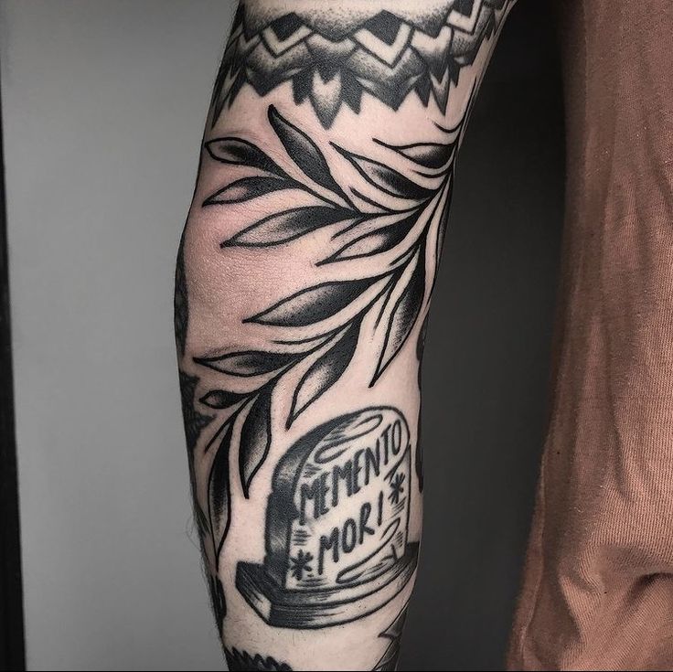 Leaf tattoo on the elbow for men