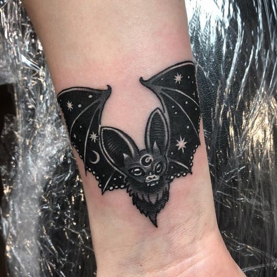 Bat tattoo on the wrist for men