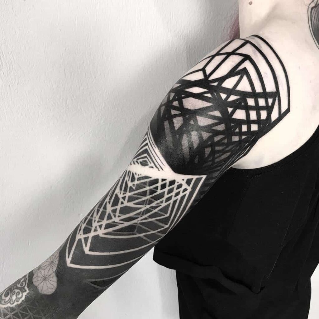 Blackwork tattoo on arm for men