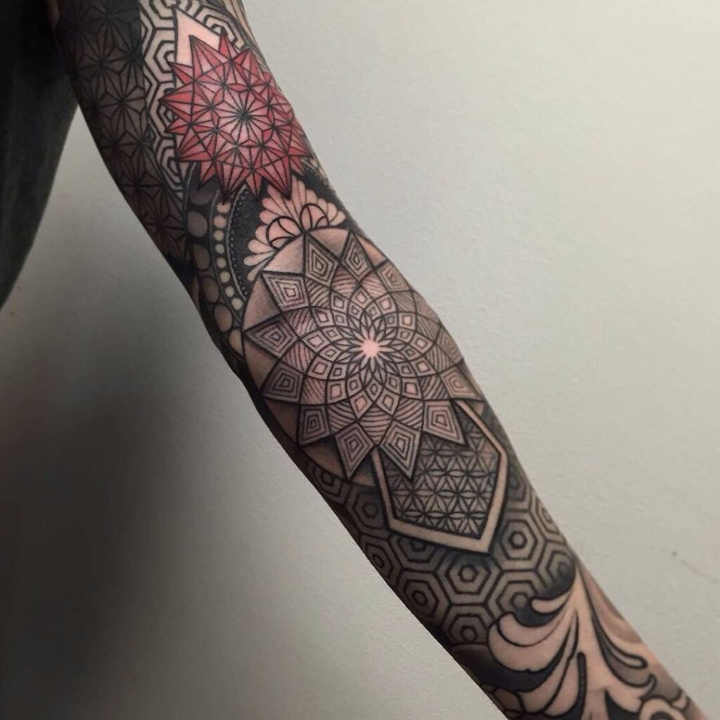 Blackwork tattoo on arm for women