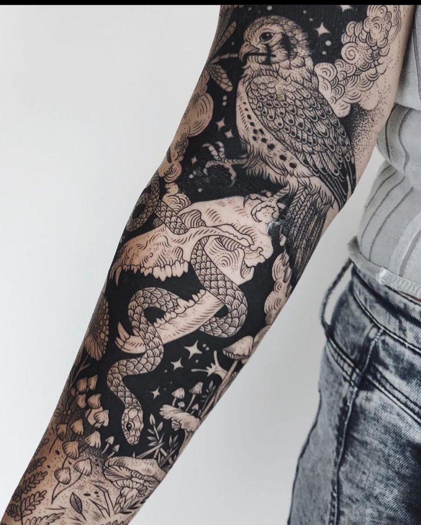 Blackwork tattoo on arm for women