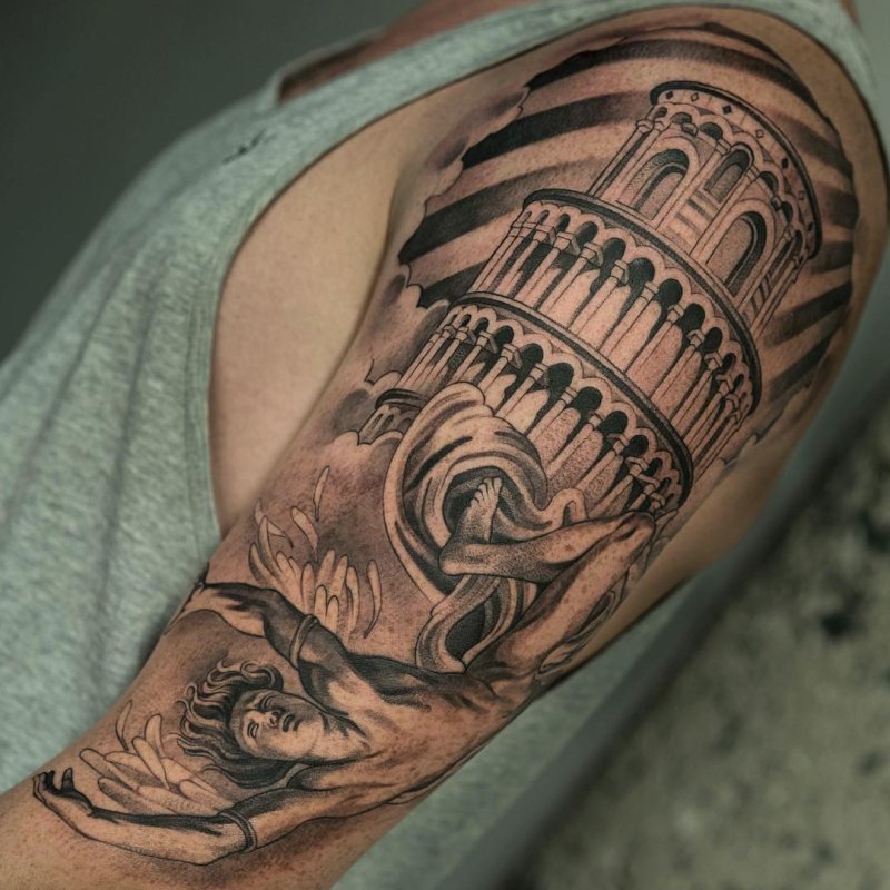 Greek-style tattoo on the shoulder for men