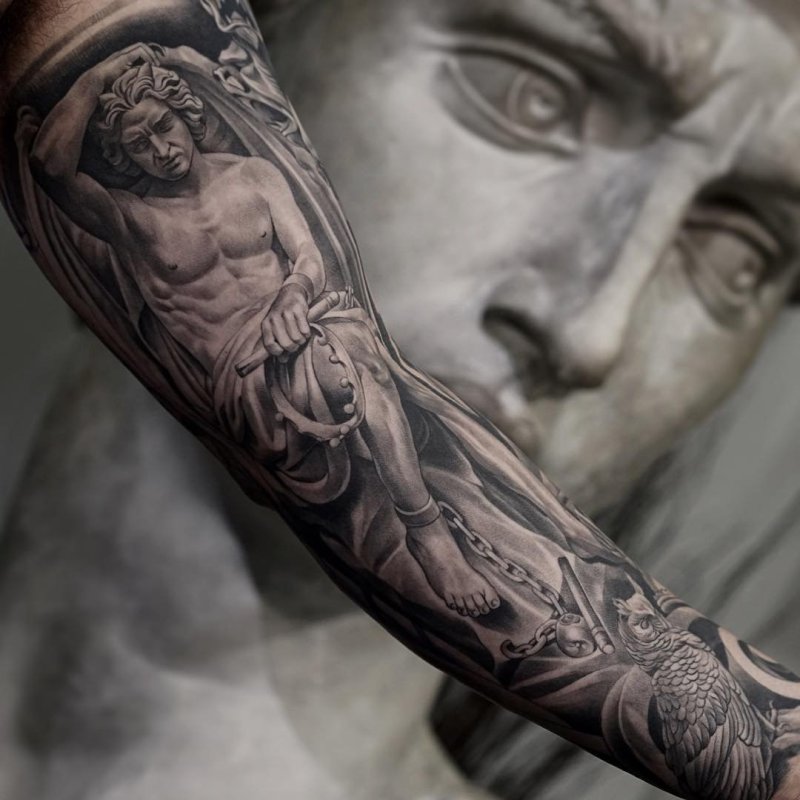 Greek-style tattoo on the arm for men