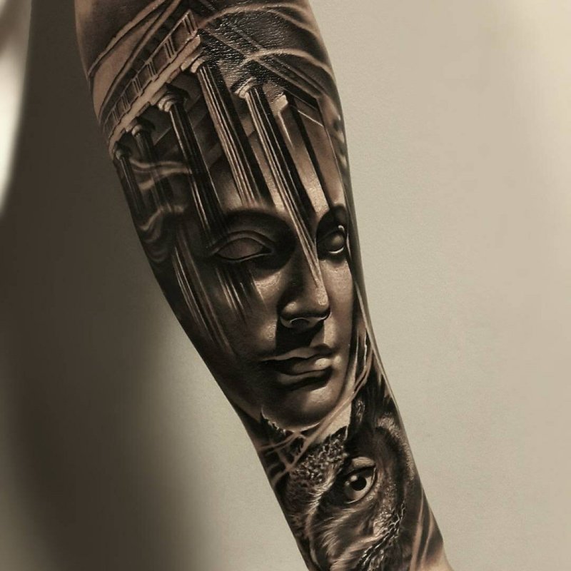 Greek-style tattoo on the arm for women