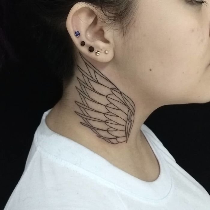 Large krile tattoo on the neck for women