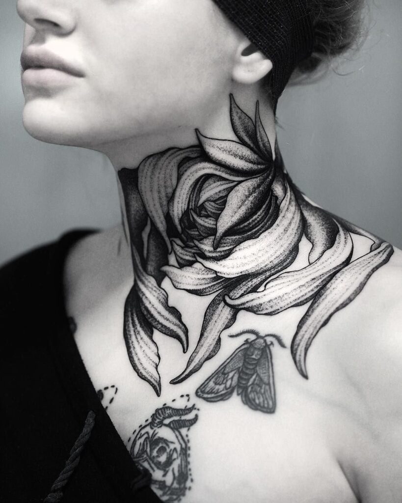 Flower tattoo on the neck for women