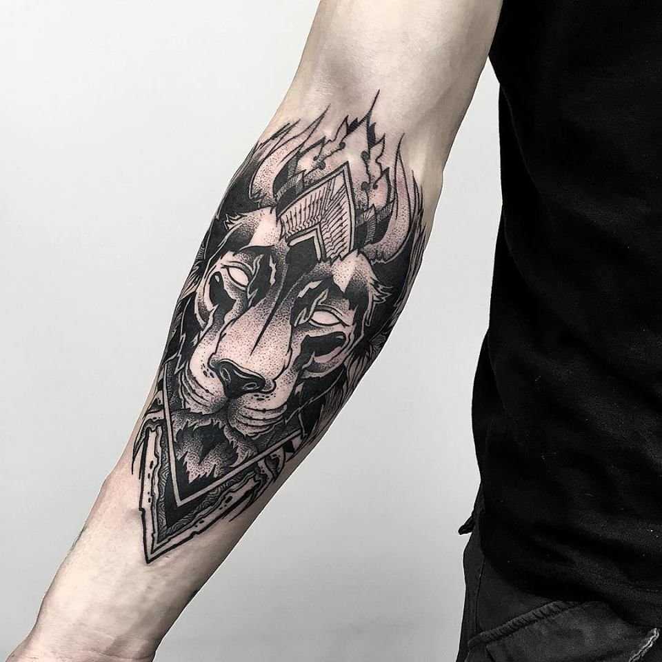 Large tattoo on the forearm for men