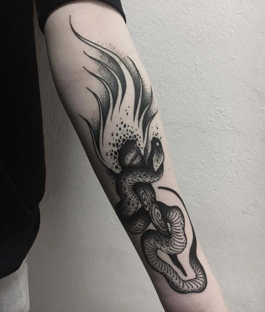 Snake tattoo on forearm for men