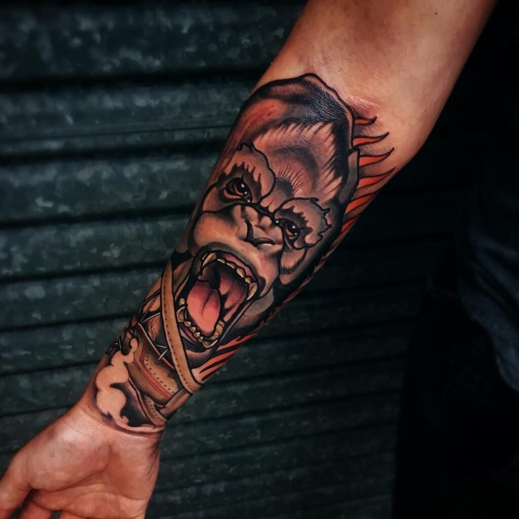 Color gorilla tattoo on forearm for men