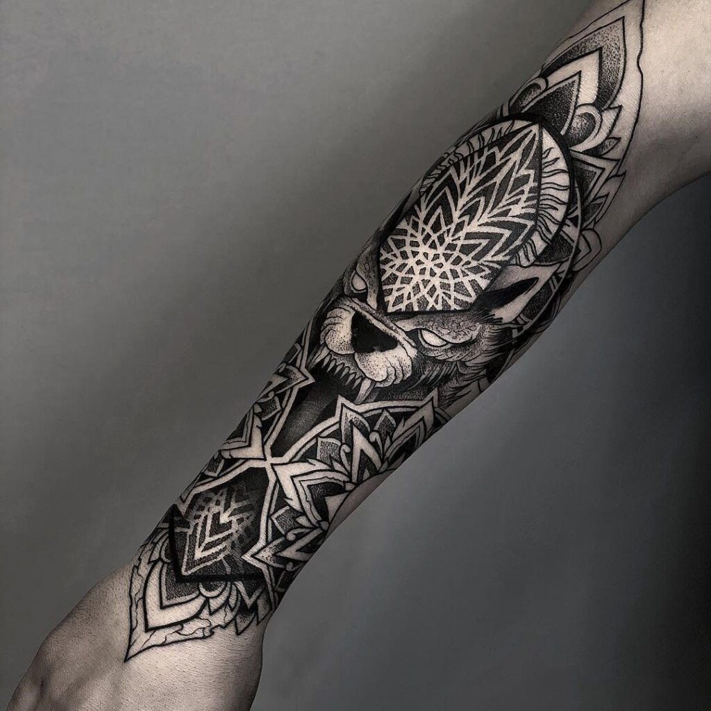 Large tattoo on the forearm for men