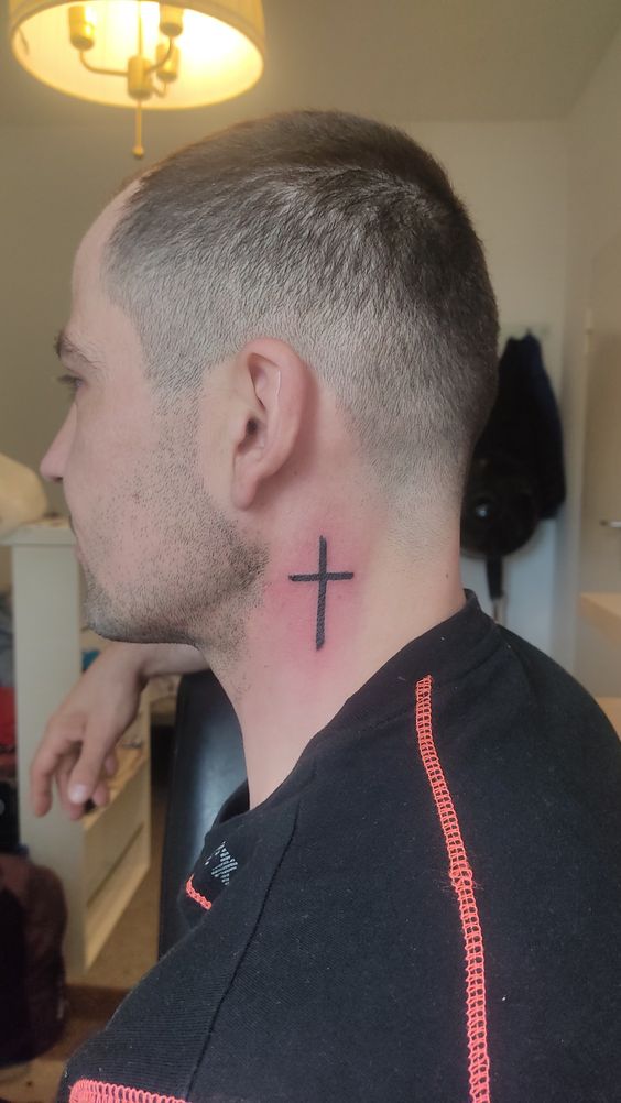 Cross tattoo on the neck for men Cross tattoo on the neck for men