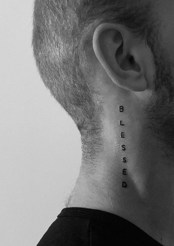 Tattoo with the inscription on the neck for men