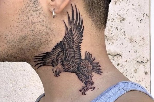 Large eagle tattoo on the neck for men