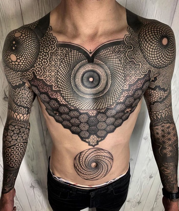 Blackwork style tattoo on the abdomen for men