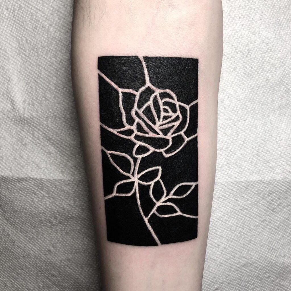 Blackwork tattoo on the forearm for men