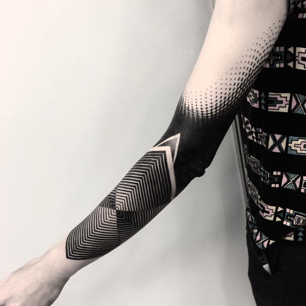 Blackwork tattoo on the arm for men