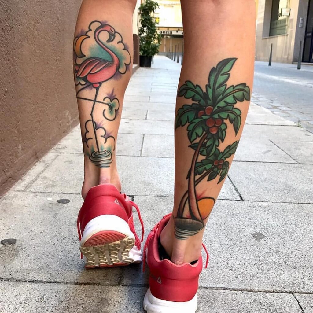 Large palm and flamingo tattoo on the calf for women