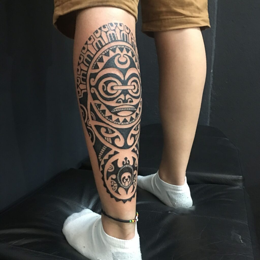 Large tattoo on the calf for men