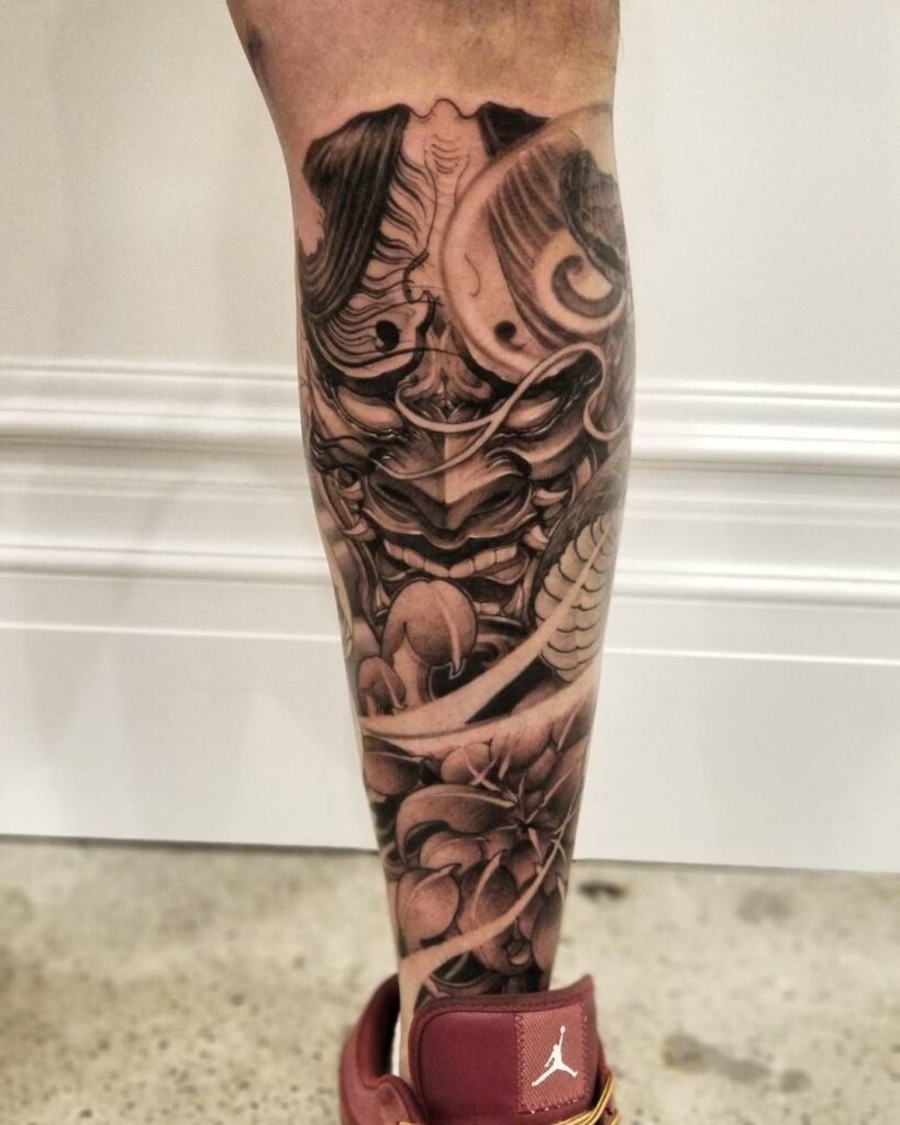 Large tattoo on the calf for men