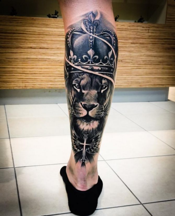 Large tattoo of the left on the calf for men