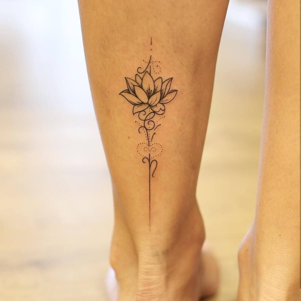 Lotus tattoo on the calf for women