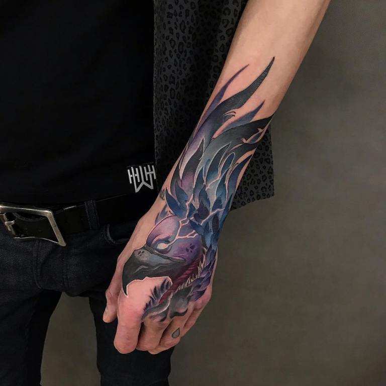 Color tattoo on the arm for men