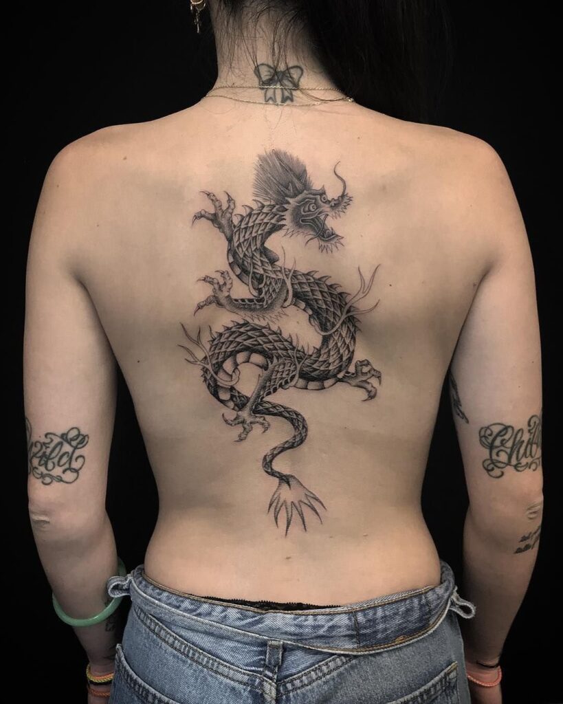 Dragon tattoo on the back for women