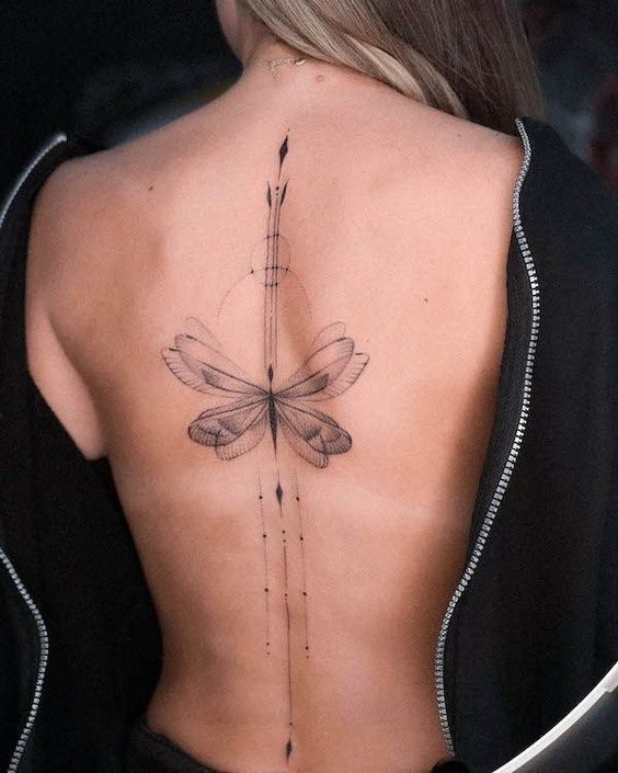 Butterfly tattoo on the back for women