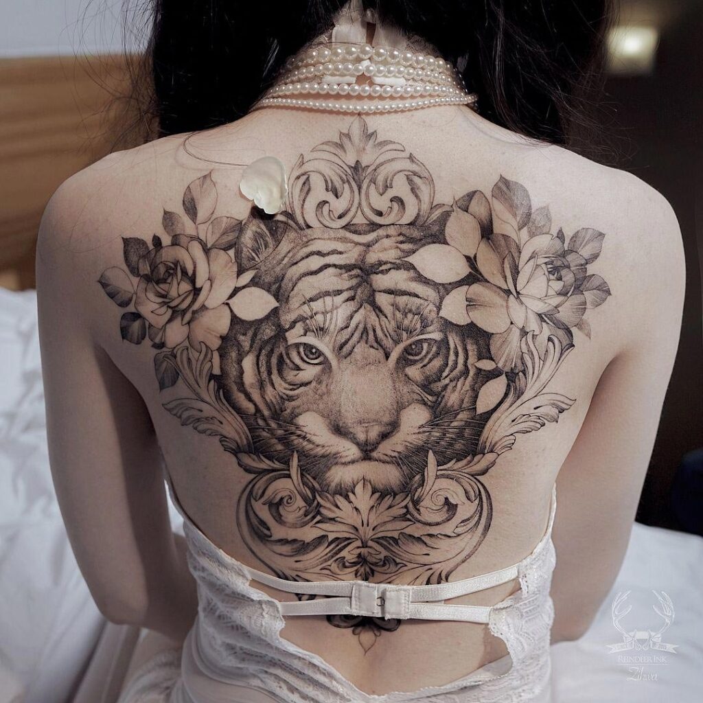 Large tattoo on the back for women