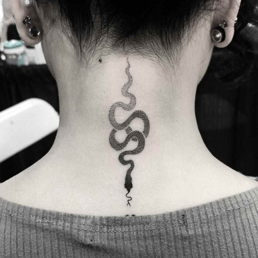 Snake tattoo on the back of the head for women