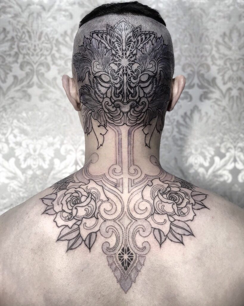 Large tattoo on the back of the head for men