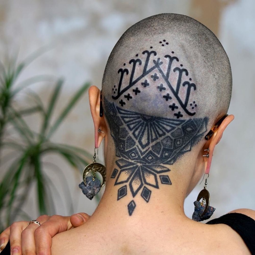 Tattoo on the back of the head for women