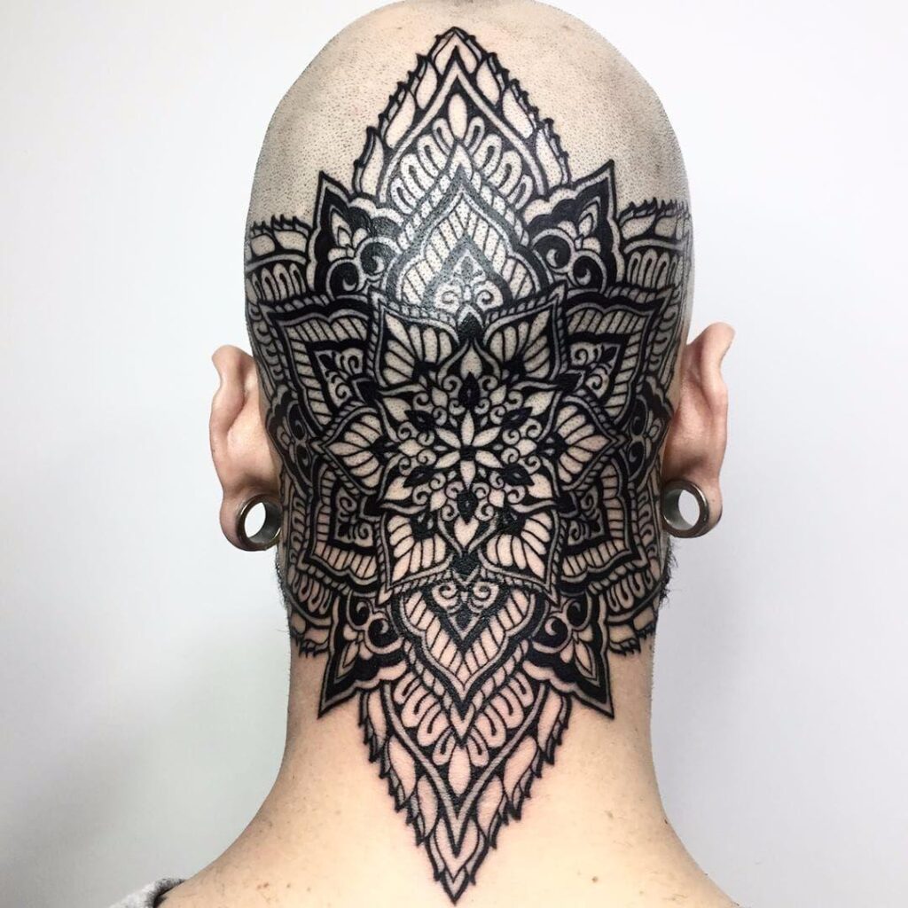 Large tattoo on the back of the head for men