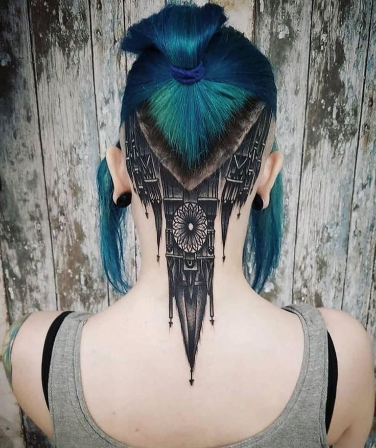 Large lock tattoo on the back of the head for women