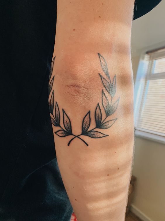 Elbow tattoo for men Elbow tattoo for men