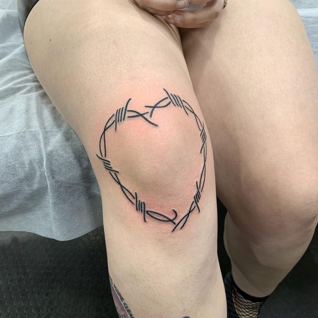 Heart tattoo on the knee for women