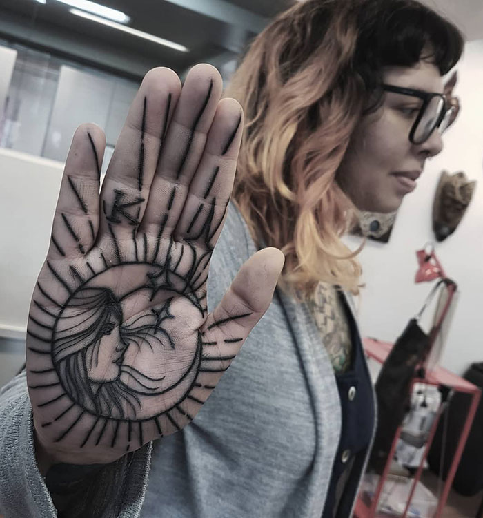 Tattoo of a girl on the palm for women