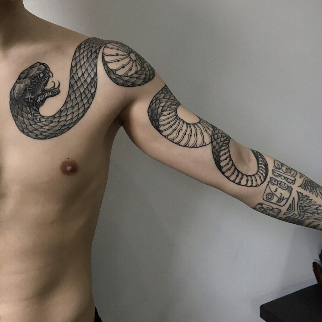 Snake tattoo on the shoulder for men