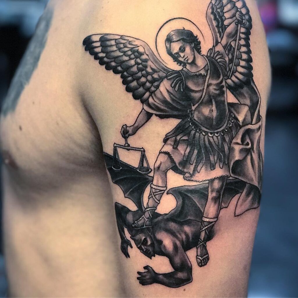 Tattoo of an angel on the shoulder for men