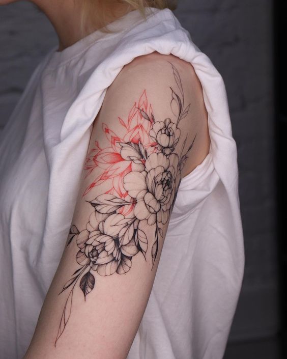 Flower tattoo on the shoulder for women