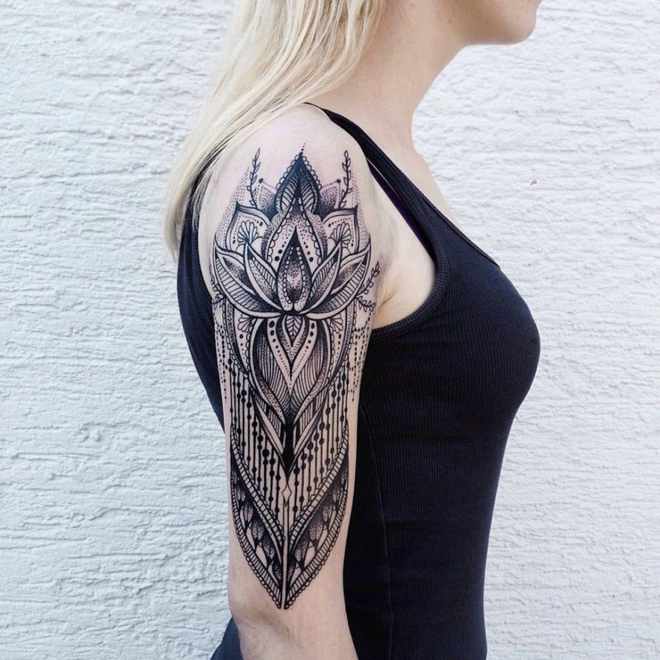 Large tattoo on the shoulder for women