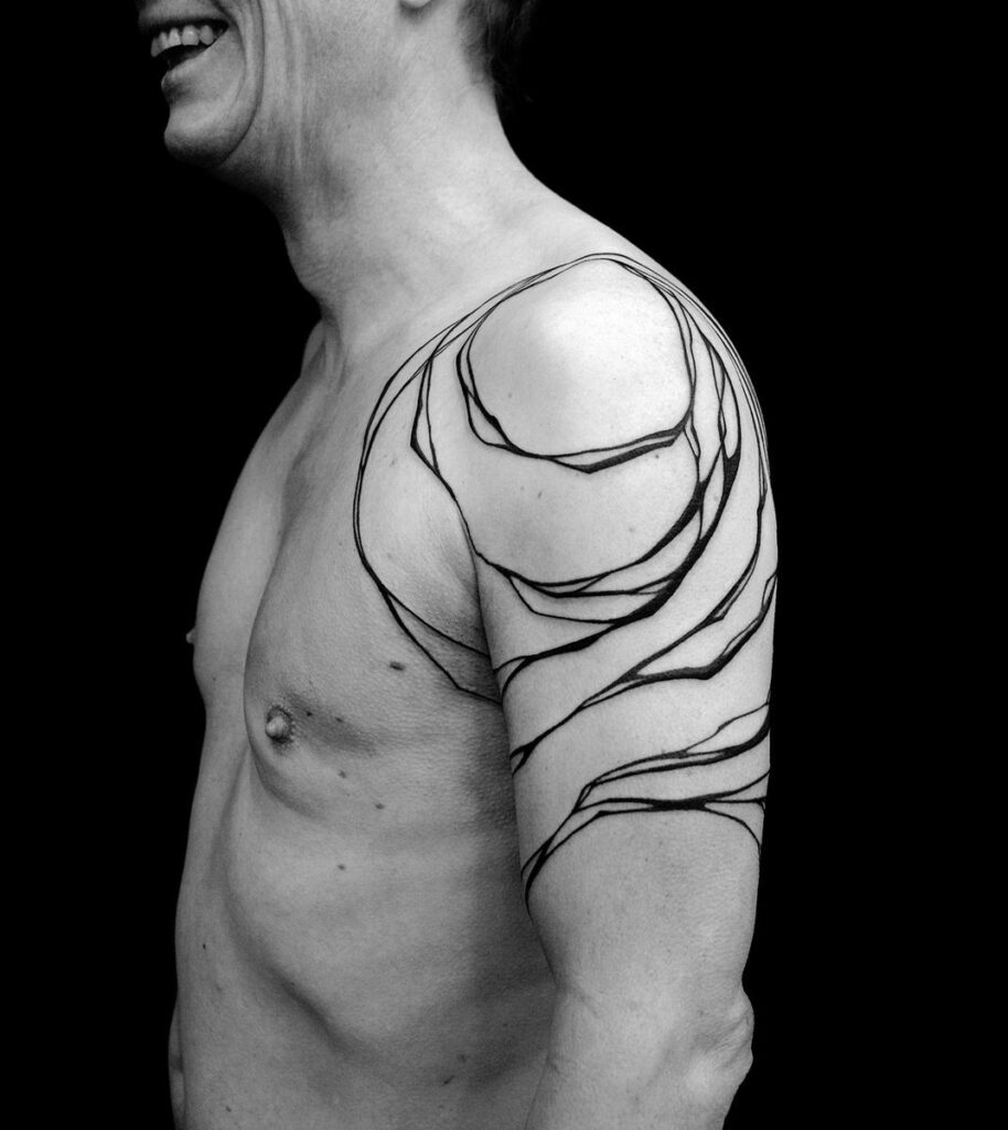 Large tattoo on the shoulder for men