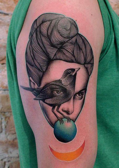 Tattoo of a girl and a bird on the shoulder for men