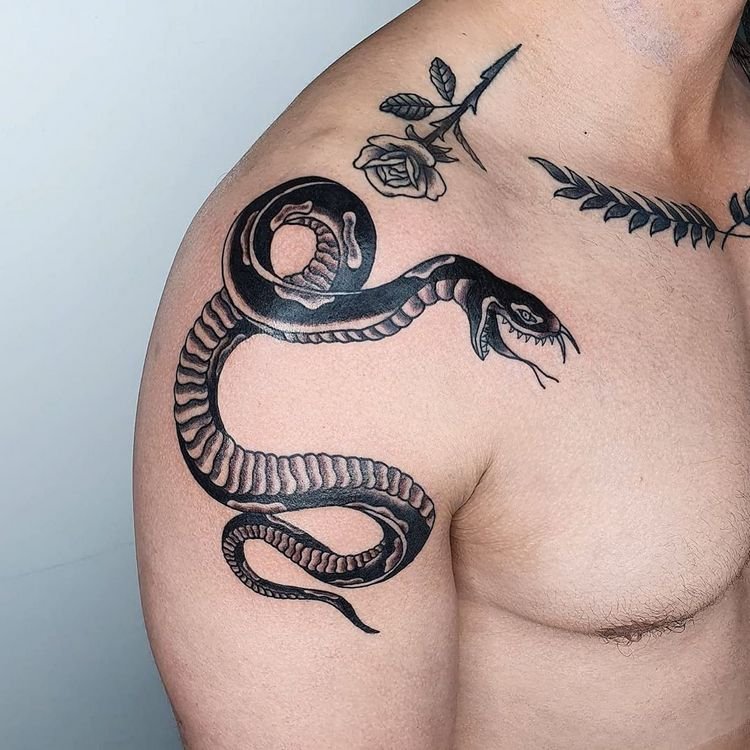 Snake tattoo on the shoulder for men