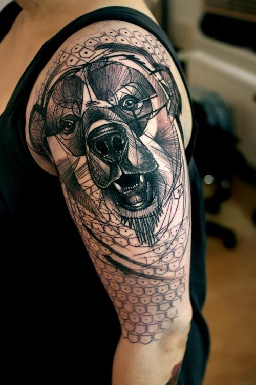 Large tattoo of a bear on the shoulder for men