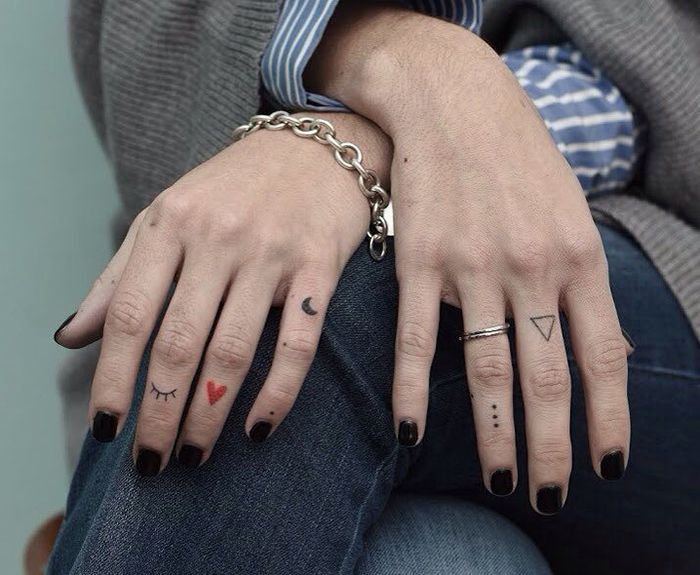 Tattoo on fingers for women