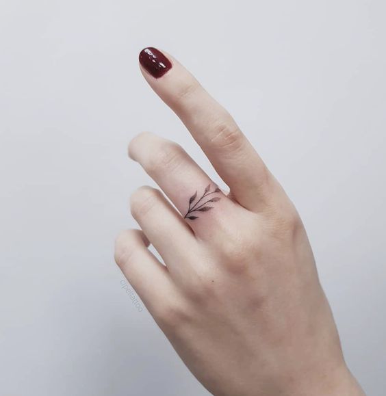 Tattoo on the finger for women