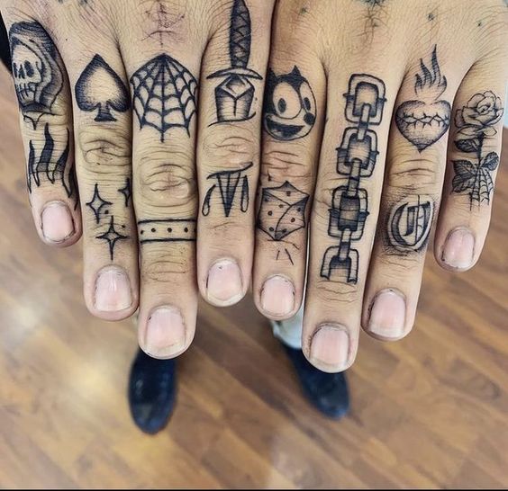 Tattoo on fingers for men