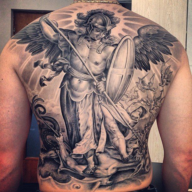 Large tattoo on the back for men